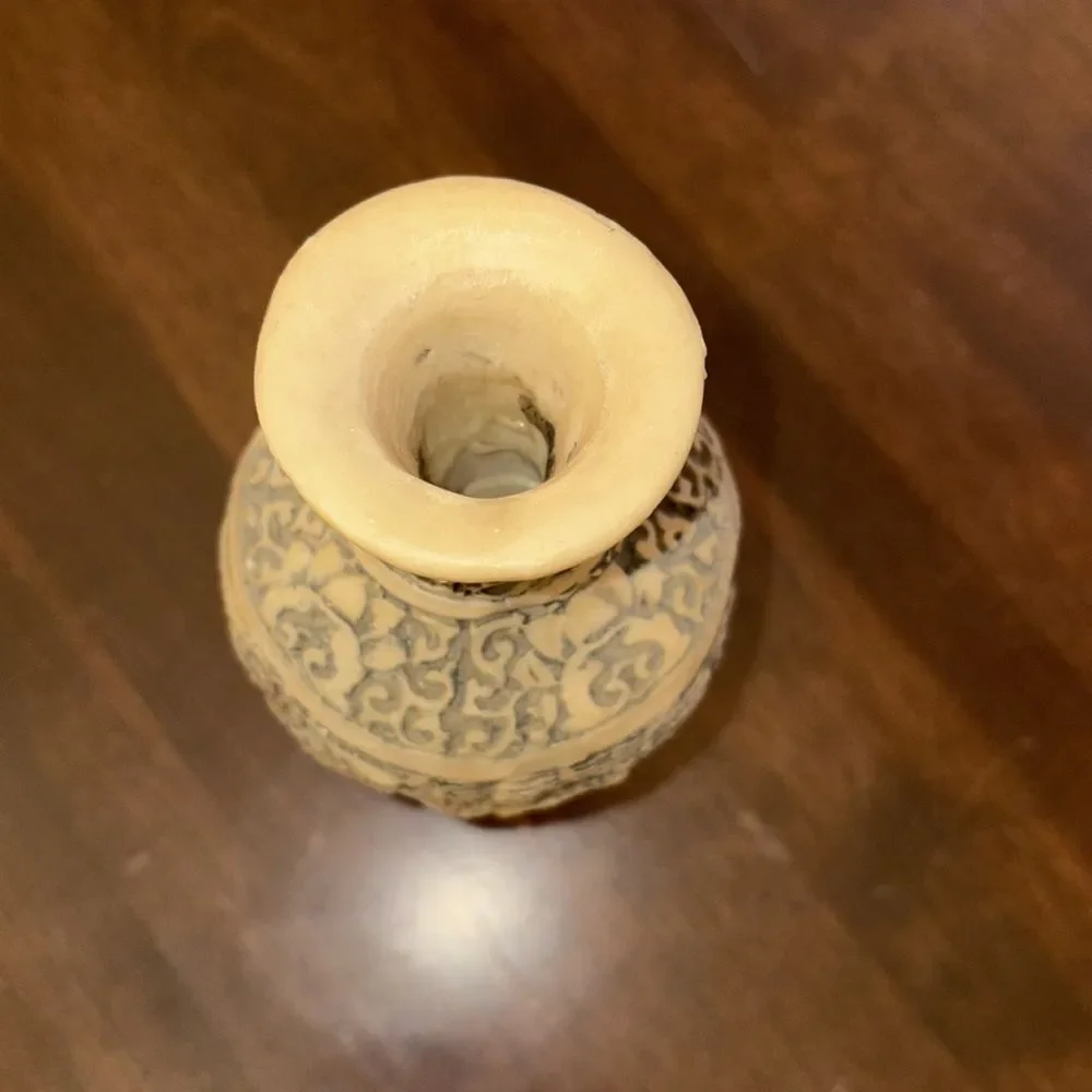 Carved candle holder